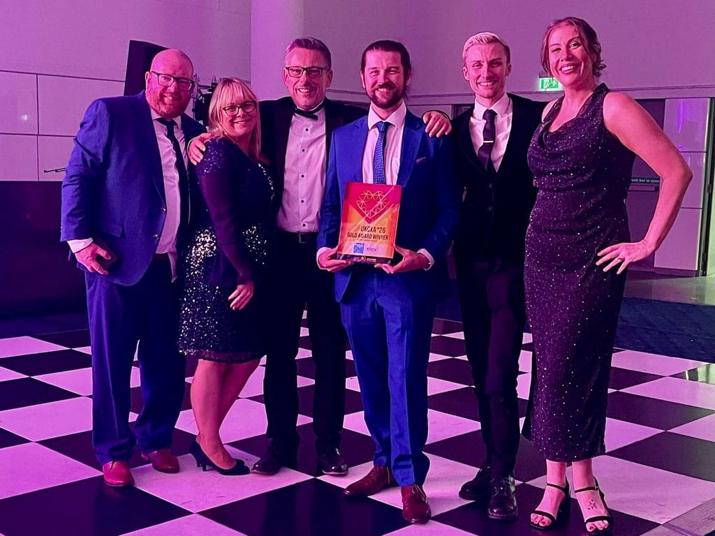 Elev-8 quarterly update Q3 2026: the Bupa and Elev-8 team with their UKCXA Gold award
